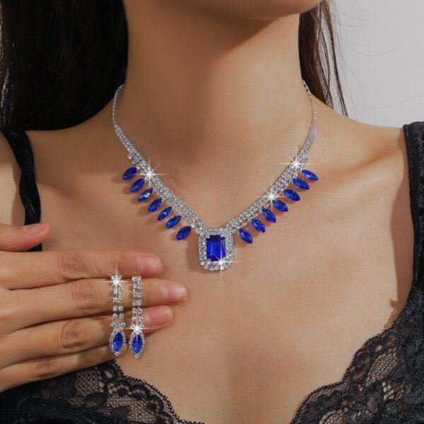 Elegant Banquet Attire: Stylish Dress & Suit with Necklace - Image 2
